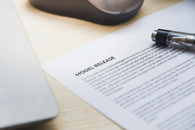 paper, model release, form, document, signing, pen, desk, agreement, business, contract, signature. Discovery platform contracts: five checks before you sign
