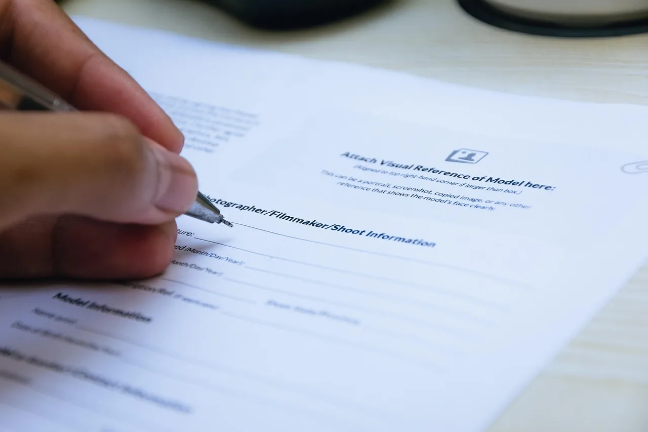 signing, paper, hand, close up, document, writing, pen, office, business, agreement, contract, paper, agreement, agreement, agreement, contract, contract, contract, contract, contract. How US agency holding companies run procurement for influencer platforms